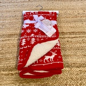 Red Holiday Blanket with White Reindeer Pattern kids